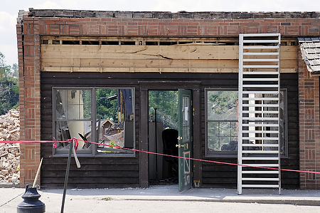 A former attorney's office across from the old Morgan County Courthouse suffered extensive damage in the March 2 tornado. The rear of the building has been demolished since then. The building is shown here May 16.  Photo by Tom Eblen | teblen@herald-leader.com